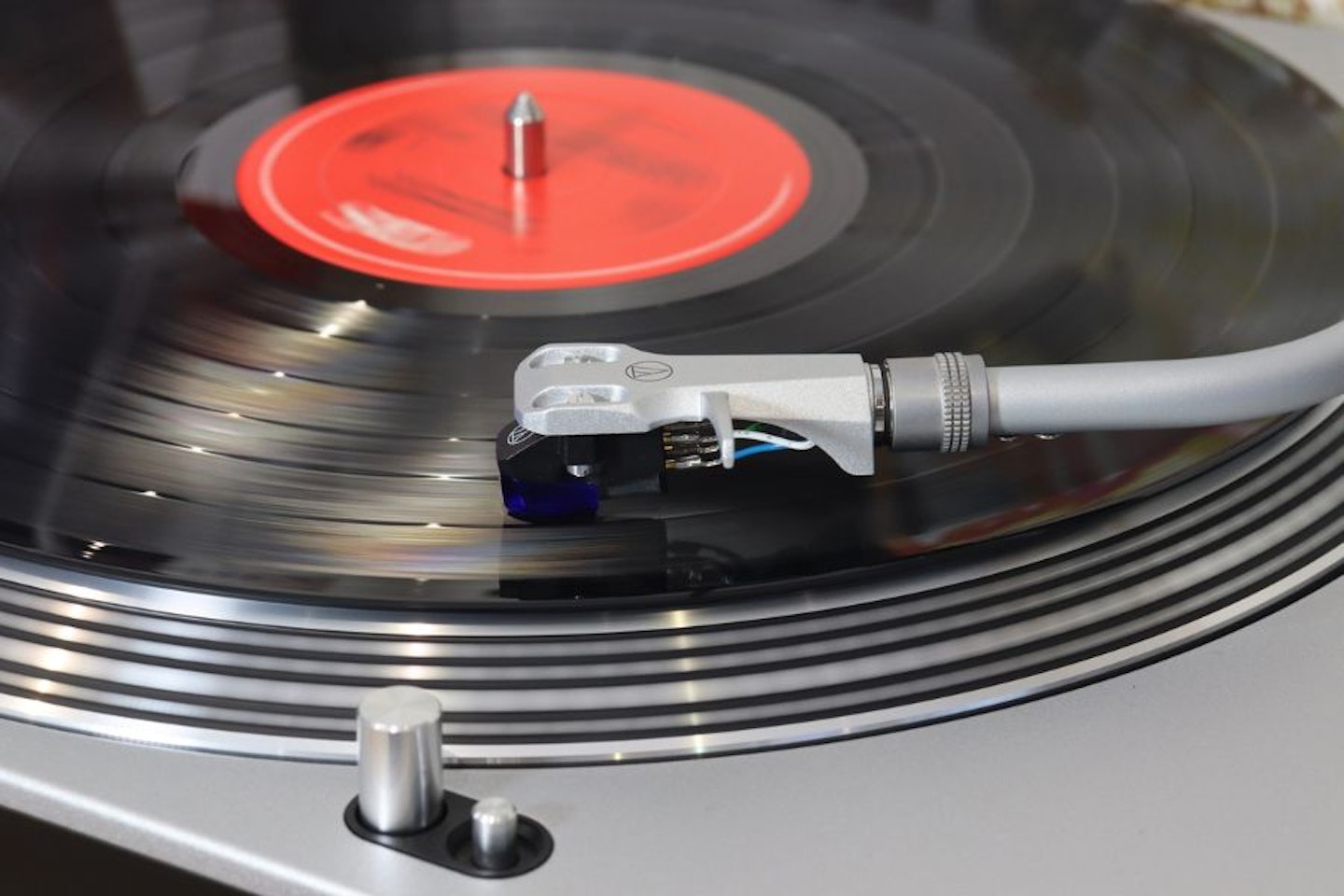 Audio-Technica LP140XPSVEUK Professional Manual Turntable - tonearm playing record